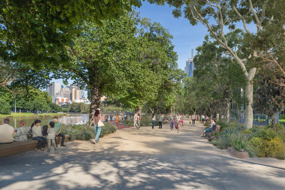 An artist's impression of the Birrarung Marr Site 1 designs. People are enjoying the sunny weather on a broad promenade by the river, under a canopy of indigenous trees.