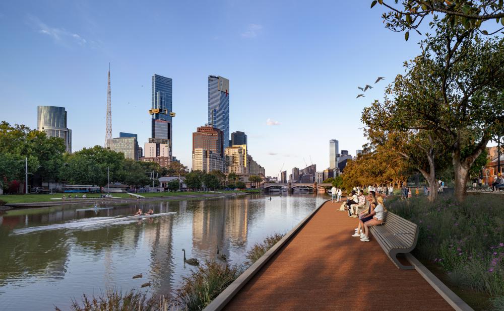 An artist’s impression of what the Fig Tree Boardwalk might become.  The image shows the city skyline in the distance, with the new treelined promenade beside the river that runs through the middle of the image.