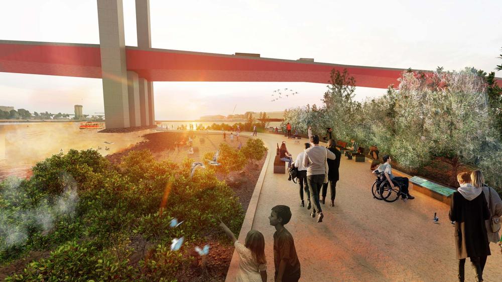 An artist’s impression of what Collins Wharf Park might become. The image shows a bridge extending from left to right in the horizon, with the promenade curving under it while running alongside the harbour. The water and promenade are separated by native plants and open park space. The promenade is busy with pedestrians exercising, observing the harbour and native plantings or utilising bench seats.  