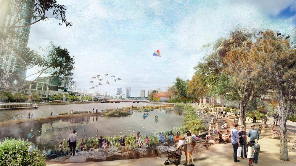 An artist’s impression of what the Turning Square and Enterprize Park area might become. The image shows a more natural rivers edge, alongside boardwalks and waterfront steps. People are using the waterfront steps to sit and observe both kayakers and ducks along the river. The boardwalk is filled with families, bike riders, people reading books and someone flying a kite.  